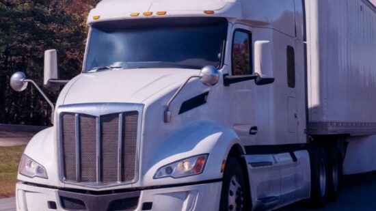truck vehicle semi highway drive shutterstock_2742073731